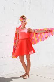 Homemade Easy Homemade Bird Costume For Kids A Colorful Outfit And Some Scrap Cardboard Can Go A Long Way To Making A Cute Halloween Costume Cardboard Bird Costume Bird Costume Kids Diy Costumes Kids