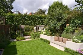 Your local family farm & home store is open to serve you: Lovely Low Maintenance Family Garden With Raised Bed For Herbs And Pl