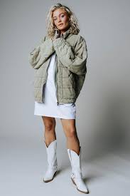 Quilted knit jacket featured in a slouchy silhouette with subtle distressing throughout. Free People Dolman Quilted Knit Jacket In Pine Slumber