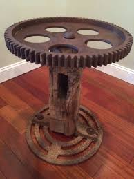 This Unique Table Is Made Of A Solid Base A Large Factory Gear Top And Reclaimed 200 Year Old Notched Barn Wood It S Wood Industrial Furniture Unique Tables