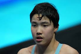 Swimming sensation, 12, becomes youngest athlete in history to win medal at  World Aquatics Championship