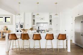 The sherill is finished with solid dark metallic iron legs and a black leather seat in a woven formation. Finding The Right Leather Bar Stools Style Space And Finish
