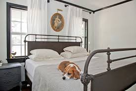 Absolutey gorgeous french country style outdoor terraced space with shabby white painted chipped decorative metal daybed piled with big slouchy faded floral linen cushion's & mattress in soft pastel's, decorative. 9 Metal Beds To Dream In Town Country Living