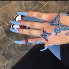 Nose Piercings Colorful Butterfly Tattoo Blue Butterfly Tattoo Butterfly Tattoo Finger Skull Butterfly Tattoo Two Butterf In 2020 Finger Tattoos Tattoos Hand Tattoos