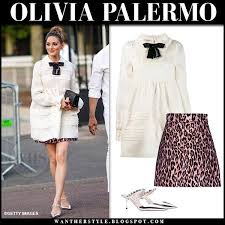 Olivia Palermo In White Babydoll Mini Dress With Black Bow And Leopard Print Mini Skirt Oliviapalerm Olivia Palermo White Babydoll Dress Olivia Palermo Outfit
