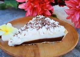 Chocolate haupia pie is a creamy coconut custard pie in a flaky pie crust and topped with whipped cream. Chocolate Haupia Pie 2 Polynesia Com Blog
