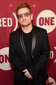 Wannabe american, irish narcissist, who reckons he has a god given right to preach at politicians about what's wrong with the world while hoarding his own obscene wealth where taxes. How Old Is Bono Is The U2 Frontman Married How Many Children Does He Have And How S His Health