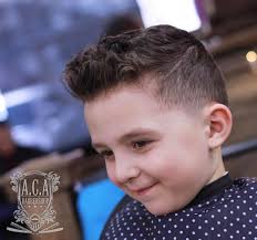 Boys with naturally curly hair may not want a super short cropped haircut, but a classic medium short that is cut above the ears is a good compromise. Boy S Fade Haircuts 2021 Trends Styles
