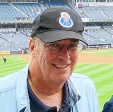 Retired bank president and football official biography