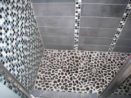 Hi, i have a stone tile shower with a glass tile running through it. Pebble Tile Shower Floor And Wall Williesbrewn Design Ideas From Engaging Pebble Tile Shower Floor Pictures