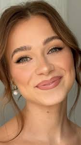 Who can recommend a wedding hair and makeup stylist willing to travel to  Mackinac Island?