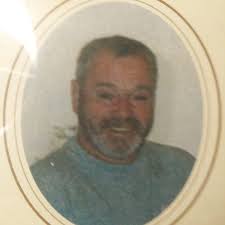 Face of 'cruel' dog abuser filmed hurling his pet over garden fence