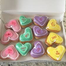 The sprinkled heart has a quintessential valentine's look. Valentine Donuts Krispy Kreme Valentines Food Heart Shaped Candy