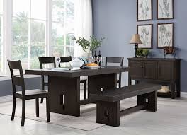 The neutral tone is just right for a classic farmhouse, coastal cottage, or traditional kitchen nook. Haddie Distressed Walnut Dining Table