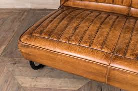 Looking for the perfect day tripper for your living room? Vintage Style Leather Sofa Armchair Peppermill Interiors
