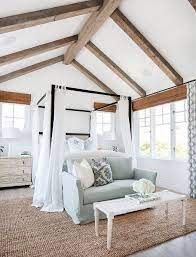 Get more coastal interior design ideas at the house tour. Beach House Design Coastal Interiors Beautifully Seaside Beach House Interior Coastal Master Bedroom Master Bedrooms Decor