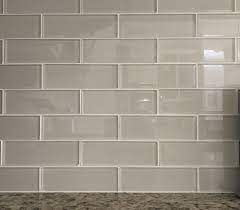 ;) i feel that white grout will create an opaque barrier and keep the light from transmitting (which creates the look) Anatolia Bliss Elemental Glass Tile As A Backsplash With White Grout In Sand Love Them But Backsplash Grey Glass Subway Tile Backsplash Glass Tile Backsplash