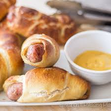Place pretzel dog on towel to drain off excess solution and arrange on coated tray in 2 rows of 4. Mini Chicken Sausage Pretzel Dogs By Mariahspleasingplates Quick Easy Recipe The Feedfeed