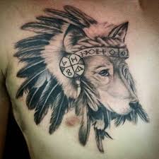 The howling wolf and the image of a native american woman above it give it an ethnic look. Amazing Wolf Tattoo Idea Best Designs With Meaning Flowertattooideas Com