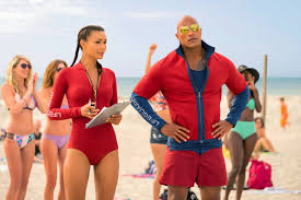 Baywatch veteran mitch buchannon moonlights as a p.i. Dwayne Johnson S Ample Chest Charms Cannot Rescue Baywatch Review