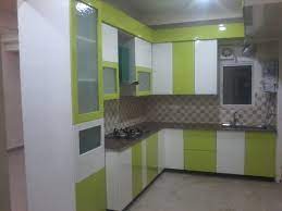 My collection of lime green kitchen decor and accessories. Closely Packed Modular Kitchen With Lime Green And White Colored Cabinets By Chauthi Interior Design