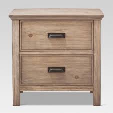 A night stand is a small table or cabinet that usually sits beside a bed. Gilford 2 Drawer Nightstand Threshold Target
