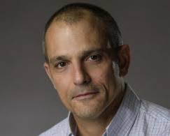 What do you most want to understand about how collective features emerge in  microbial communities?