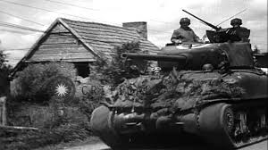 The division played important roles during world war ii in the invasions of germany, north africa, and sicily and in the liberation of france, belgium, and the netherlands. Us Army 2nd Armored Division Enters Canisy France During World War Ii Hd Stock Footage Youtube