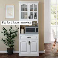 If you're planning to store dishes, appliances and other kitchen accessories alongside your food, opt for a larger pantry that's 30 to 36 inches wide. Kitchen Storage Cabinet White Kitchen Pantry