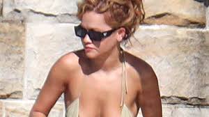 In 2012, ora released her debut album, ora which debuted at number one in the u nited kingdom. Rita Ora Rocks A Bikini As British Singer Sunbakes At Sydney Mansion Bpositivenow