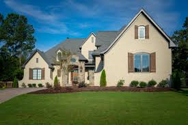 Gorgeous Beige Brick Home With Stone And Dark Wood Accents Love That Paver Driveway Too Goodwin Foust Custom Custom Home Builders Custom Homes Lake Keowee