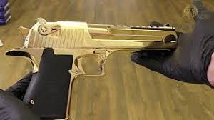 This iconic pistol is plated in 24 karat gold! 24k Gold Plated Desert Eagle Mark Xix 357 Magnum Only One Youtube