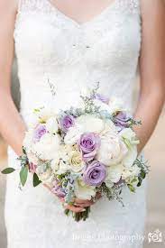 Purple and ivory wedding bouquets. Soft And Romantic Lavender Gray And Ivory Bridal Bouquet With Large Peonies Ivory Bridal Bouquet Lavender Wedding Wedding Bouquets