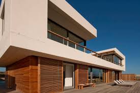 A great view of the ocean across the street. Big Bay Beach House By Coa And Fuchs Wacker Architekten