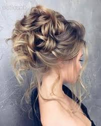 Messy updos can provide a little unique twist from the traditional sleek and straight ones. High Messy Bun Bridal Updo Hair Styles Messy Hair Updo Messy Hairstyles