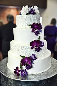 White And Purple Wedding Cake With Cascading Purple Flowers In 2020 Violet Wedding Cakes Wedding Cakes With Flowers Purple Wedding Cake