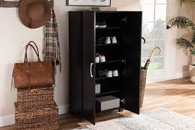 A stylish solution for keeping your entryway tidy, this shoe storage cabinet bench allows you to stash shoes out of sight while also giving you a place to sit to take your shoes on and off. Baxton Studio Marine Modern Wenge Dark Brown Finished 2 Door Wood Entryway Shoe Storage Cabinet Sesc294 Wenge Shoe Cabinet