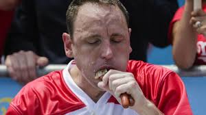Hot dog eating machine Joey Chestnut sets record with 74 weiners in 10  minutes