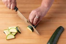 Next, rub both sides of the zucchini slices with olive oil and season with salt and pepper and your choice of fresh herbs. How To Cut Zucchini For Soup Stew And Stir Fry