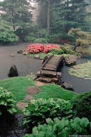 Japanese Garden With Island And Bridge Japanese Garden Japan Garden Japanese Garden Design
