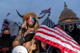 May 21, 2021 · a federal judge on friday ordered a mental health assessment for jacob chansley, the man nicknamed the qanon shaman who was widely photographed wearing a horned headdress inside the u.s. Qanon S Conspiracy Theories Stoked By China Russia Terrorism Expert The Crime Report