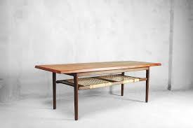 For Sale On 1stdibs This Classic Sofa Table Was Manufactured In Denmark During The 1960s It Was Finished In Teak Coffee Table Coffee Table Coffee Table Cane