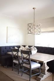 Black Tufted Dining Banquette With Reclaimed Wood Dining Table Contemporary Dining Room Dining Nook Living Dining Room Dining Room Design