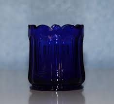 We offer a wide variety of unscented votives and scented votives to use within these holders. Cobalt Blue Glass Votive Candle Holder Tealight Candle Etsy Glass Votive Candle Holders Glass Votive Votive Candle Holders