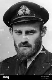 Royal Navy Lt. Peter G.C. Dickens, son of Admiral Sir Gerald Dickens and  great grandson of Charles Dickens, England's great novelist, is pictured,  May 14, 1943 after light coastal forces he commanded