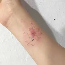 45 Elegant Cherry Blossom Tattoo Designs Of 2020 Blossom Tattoo Cherry Blossom Tattoo Cherry Blossom Tattoo Wrist