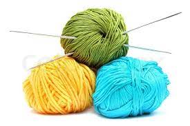 The obvious is a christmas ornament, but knitted balls can also be the basis for knitting toys or snowmen. Balls Of Wool With Knitting Needles Stock Image Colourbox