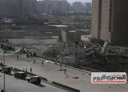 جيران عقار منشية ناصر «المنهار» يرون الكارثة. Hzdcarfnulcjzm