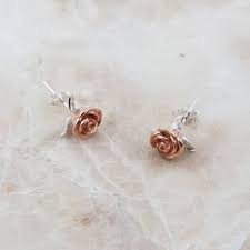 Explore classic and modern tiffany earrings for every occasion, including diamond studs, hoop earrings and colored gemstone earrings in silver and 18k gold. Sterling Silver Rose Gold Flower Stud Earrings By Nikita By Niki Notonthehighstreet Com