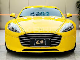 Image result for New Yellow 2016 Aston Martin